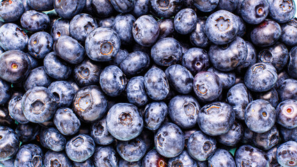 Macro shot blueberry pattern on bright background from adobe. Food and vegetarian concept with copy space