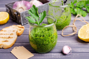 Green sauce in a glass jar
