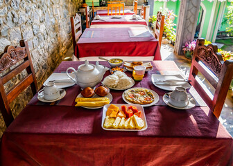 White teapot on the table set for Breakfast at a party on the island of Sri Lanka