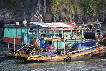 Fototapeta na wymiar Rustic Local Fishing Boat in Lan Ha Bay, Vietnam