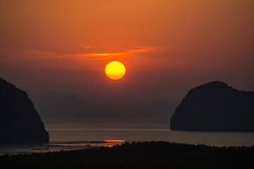 The Silhouette of the mountain Sunrise. at Samed nangshe thailand