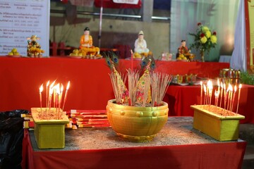 burning candles in a church