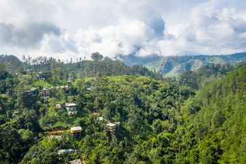 Fototapeta premium Aerial view of the houses in the mountains in the vicinity of Ella on the island of Sri Lanka