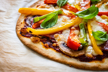 Margherita pizza on baking paper

