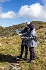 young couple traveling in the mountains
