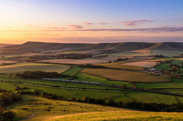 Sunrise from the top of mount Caburn on the Lewes Downs, east Sussex south east England