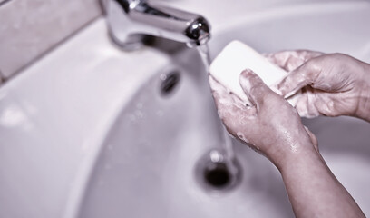 Hygiene rules. Hand washing before meals. Antibacterial treatment of hands with soap. A way to prevent virus infection. Coronavirus protection.