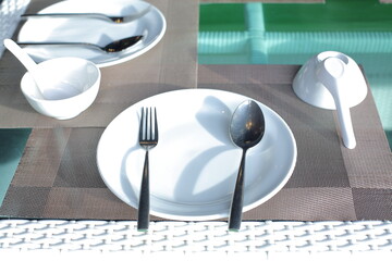 empty dinner set on the table