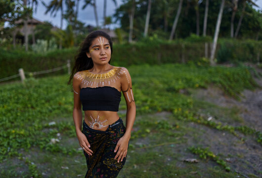 Ethnic Asian girl with pictures on her body