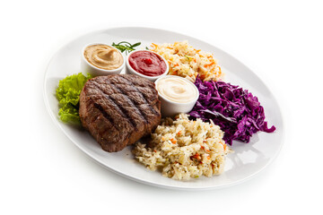 Barbecue beef steak with mix salad, mustard,  mayonnaise and ketchup on white background