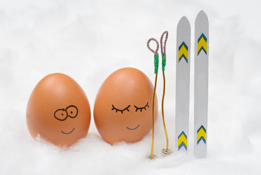 Funny lovely eggs with ski in snow