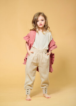 portrait of little model girl in studio