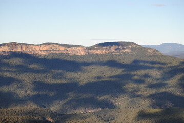 The cliffs and the hiking trails in the Blue Mountains national park in Australia on the sunny winter day