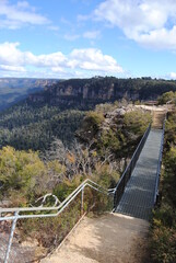 The cliffs and the hiking trails in the Blue Mountains national park in Australia on the sunny winter day