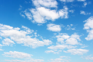 Blank sky surface with small clouds