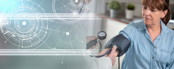 Naklejka premium Blood pressure measurement of a female patient; panoramic banner