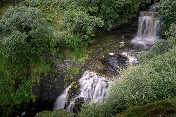 Lealt falls on the Isle of Skye, Scotland. Beautiful collection of many smaller falls flowing in different directions in gorge