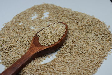 Organic natural Til Gul OR Sesame seeds over white background