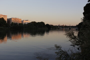 Naklejka premium sunset over the river SEVILLA 