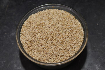 Organic natural Til Gul OR Sesame seeds over white background