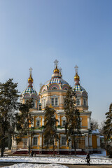 Fototapeta na wymiar Exterior architectural view of Cathedral from the park in Kazakhstan