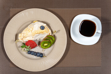 cake with raspberries and cup of coffee