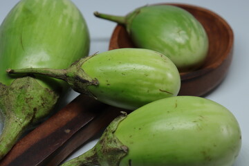 Fresh Raw Sliced green colour Eggplant Brinjal or Eggplant isolated on white background 