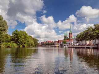 Fototapeta na wymiar Boat trip through Lübeck city during summer time