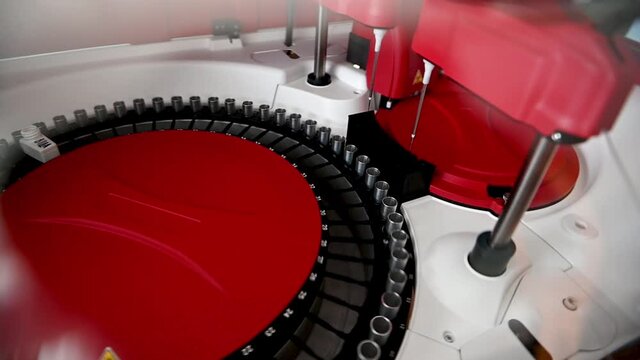 Close up shot of blood samples spinning in centrifuge during fractionation process.