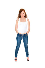 Full length portrait of a beautiful smiling woman wearing blue jeans and a top, isolated on white studio background