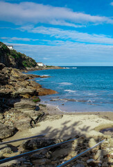 Gordons Bay surrounded by high rock cliffs and houses, turquoise blue waters great for swimming Sydney NSW Australia