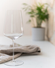 empty wine glass on a marble counter