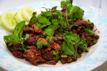 Raw meat salad with fresh blood, ready to eat