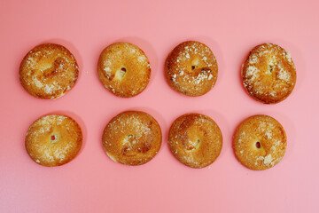 cookies on pink background, flat lay