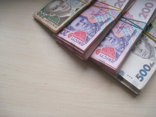 Ukrainian banknotes for 500 hryvnias and 200 hryvnias in the form of a pack and a stack for money exchange