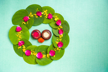 Indian festival dussehra , green leaf, rice and flowers