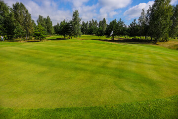 Fototapeta na wymiar Golf course covering grass for game