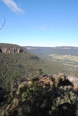 The bright cliffs with the rocks in the Blue Mountains in the national park, Australia