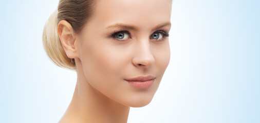 Fototapeta premium Face of a beautifyl girl. Skin lifting and cosmetics.