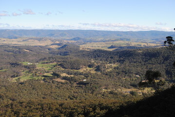 The bright cliffs with the rocks in the Blue Mountains in the national park, Australia