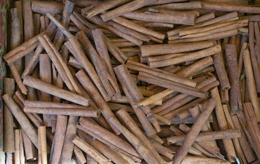 Cinnamon sticks for sale at the market a pattern of sticks