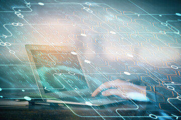 A man working on Laptop with technology theme drawing. Concept of big data. Double exposure.