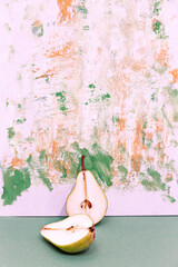 Fresh pear on design painted background. Minimal art. Autumn eco bio life concept