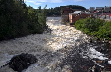 Russia, Karelia - august 2020: Hydroelectricity Laskela waterfall cascade fall