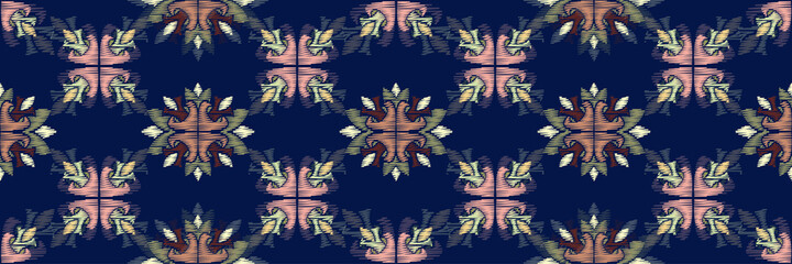 Naklejka premium Colorful Ikat ornamentel seamless pattern for textile, wallpaper, card or wrapping paper