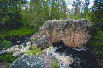 river flowing through the wilderness of Finland