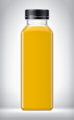 Plastic Bottle on background with Orange Juice. 