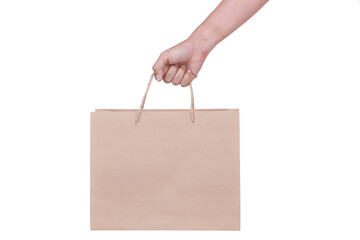 Hand Holding Paper Bag isolated on White Background. COPY SPACE.