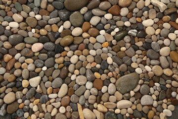 Pile sea gray stones Background from sea wet gray stones