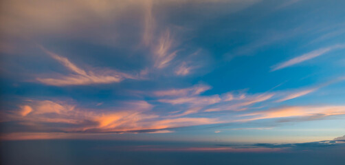 Sunset sky during twilight from airplane window